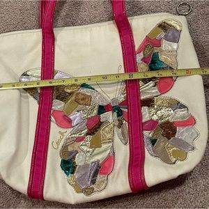 Coach shoulder bag with mosaic butterfly